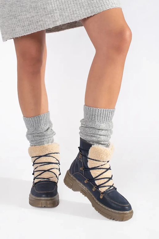 dark blue insulated boots laced Inith...