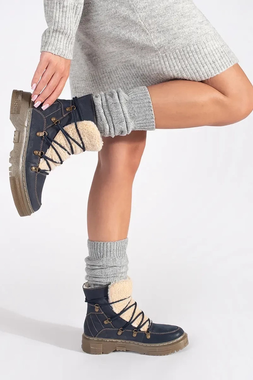 dark blue insulated boots laced Inith...