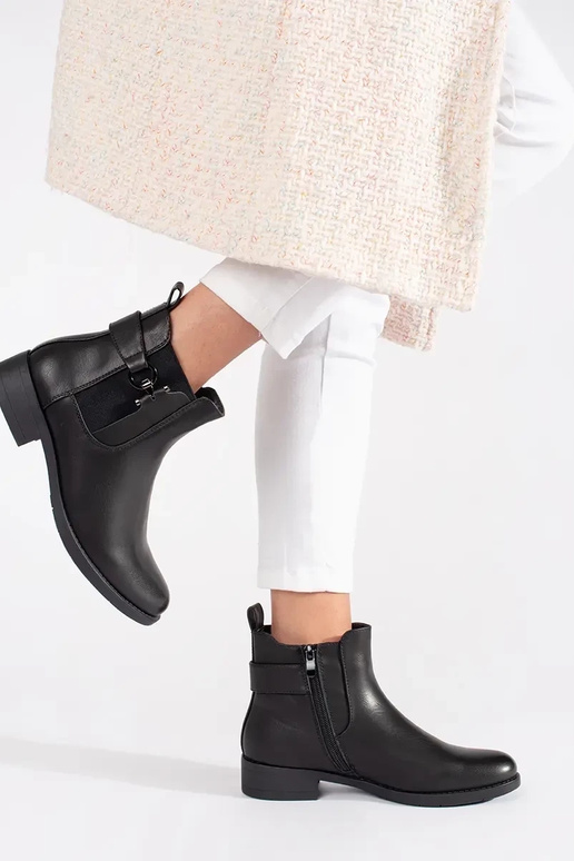 The classic model black Chelsea boots...