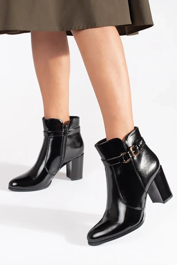 black lacquered boots on... 2