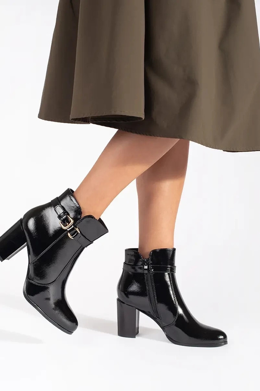 black lacquered boots on highheels...