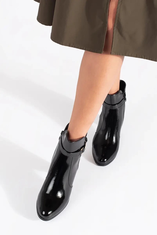 black lacquered boots on highheels...