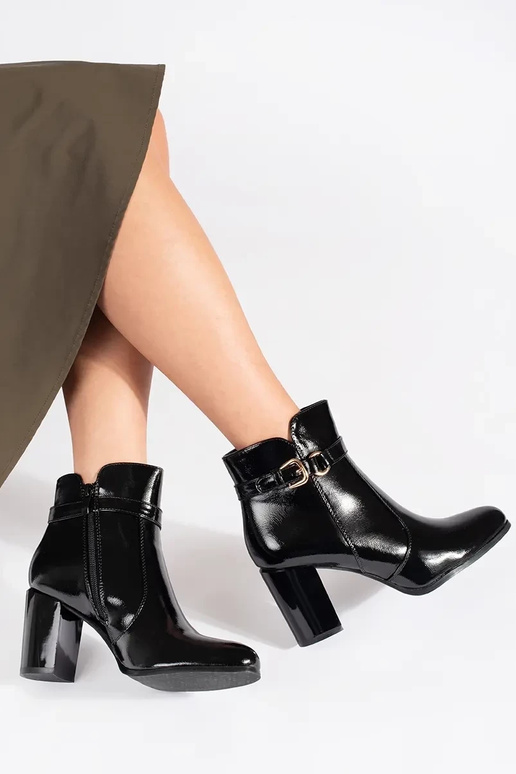 black lacquered boots on highheels...