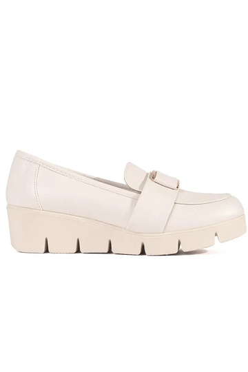 ivory shoes on a Inedge