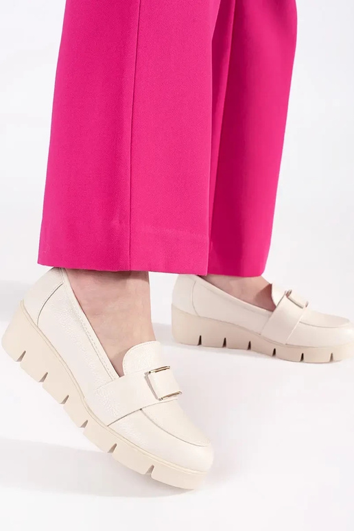 ivory shoes on a Inedge