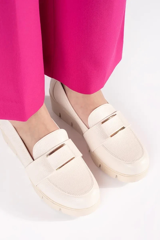 ivory shoes on a Inedge