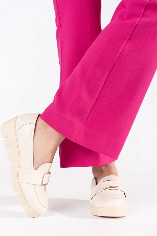 ivory shoes on a Inedge