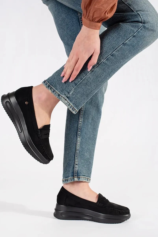 of suede INomens moccasins on a thick...