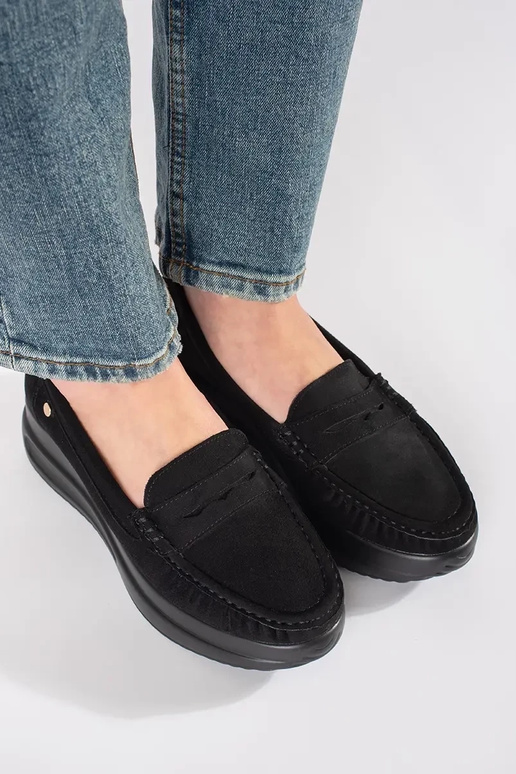 of suede INomens moccasins on a thick...