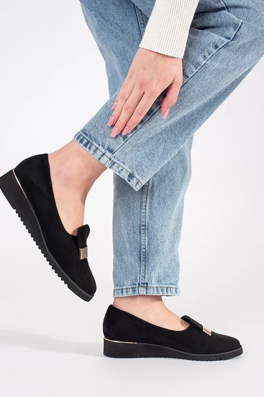 black shoes on a Inedge