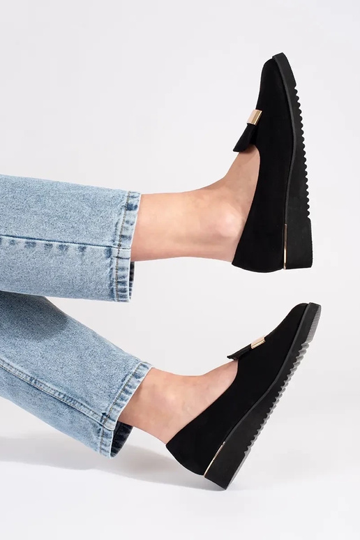 black shoes on a Inedge