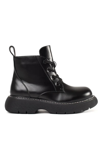 black boots laced Inith...