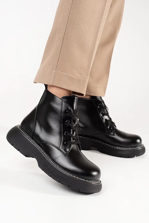 black boots laced Inith platform