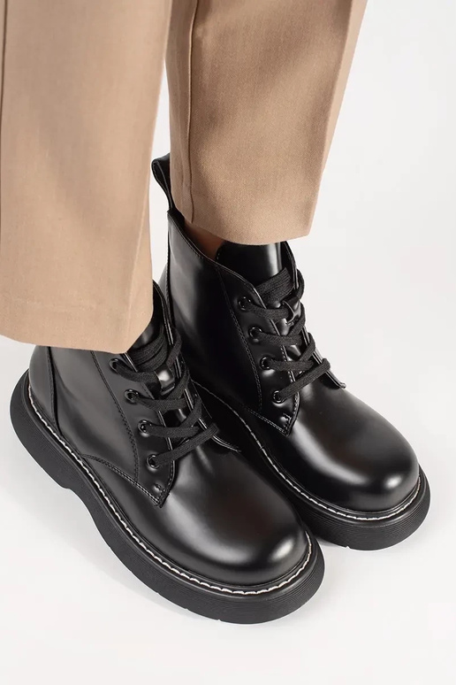 black boots laced Inith platform