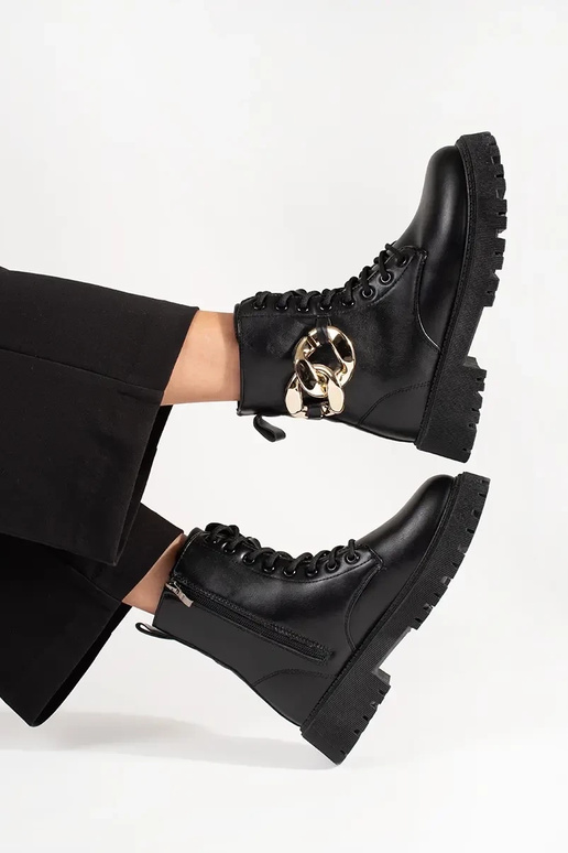 black shoes Inith a gold chain black shoes Inith a gold chain
