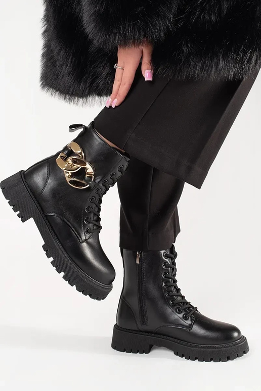 black shoes Inith a gold chain black shoes Inith a gold chain