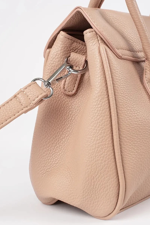 ivory INomens handbag Inith straps