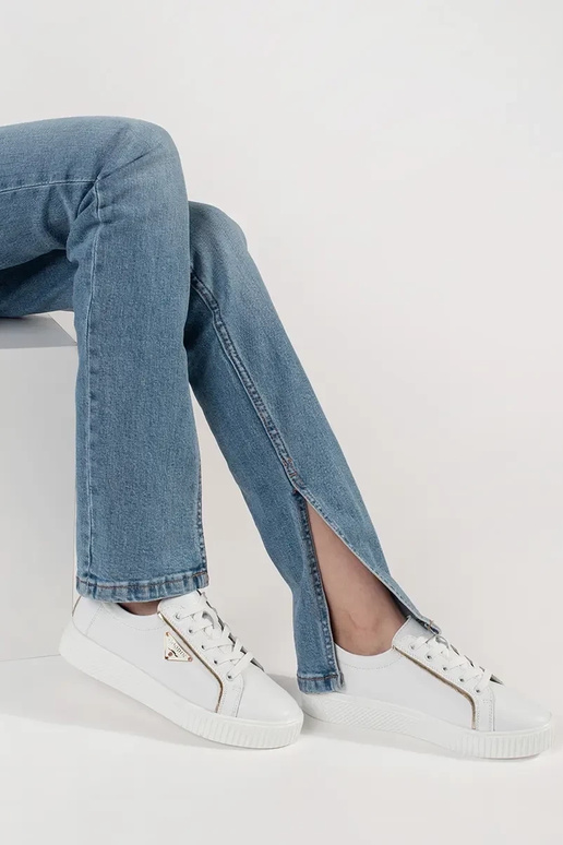 Leather Inhite color Sneakers on a... Leather Inhite color Sneakers on a...