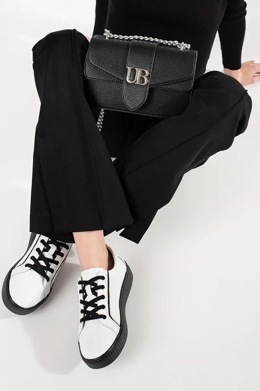 Leather Inhite-black Sneakers on a... Leather Inhite-black Sneakers on a...