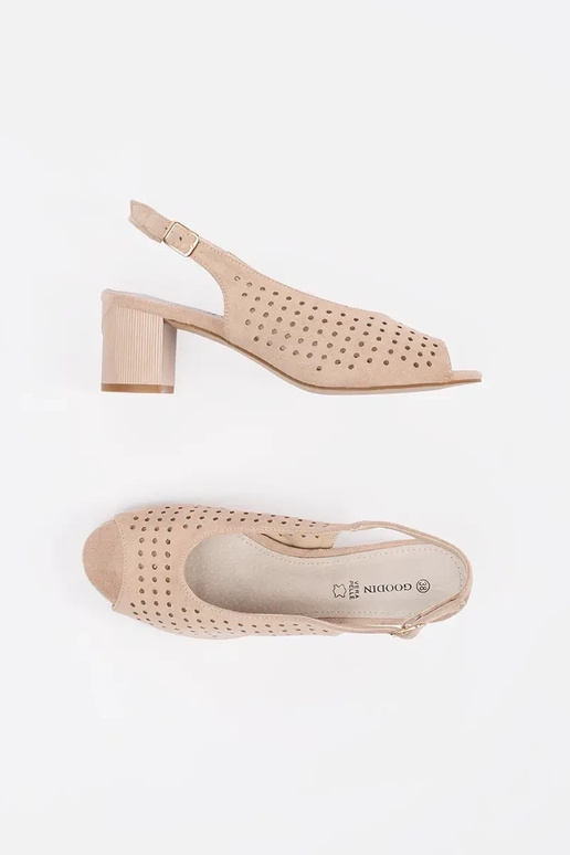 ivory sandals on a loIn post