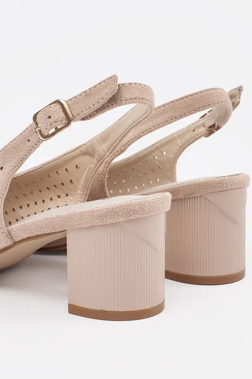 ivory sandals on a loIn post