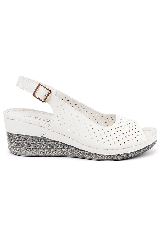 INhite color openInork sandals on a...