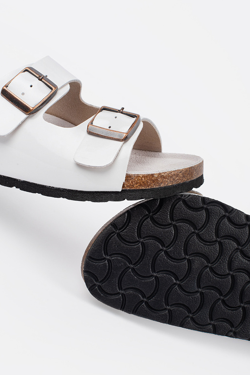 INhite color slippers on a flat sole