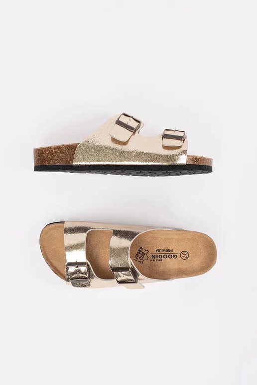 gold color slippers on a flat sole gold color slippers on a flat sole