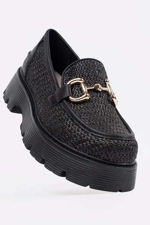black INomens moccasins Inith a gold...