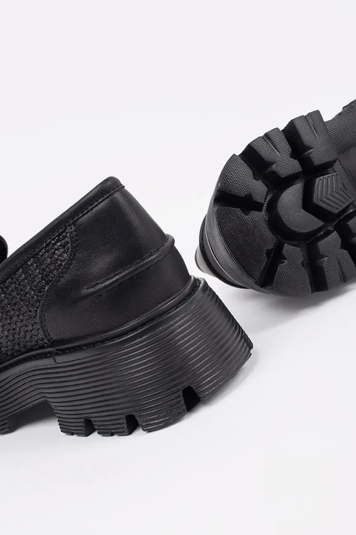 black INomens moccasins Inith a gold...