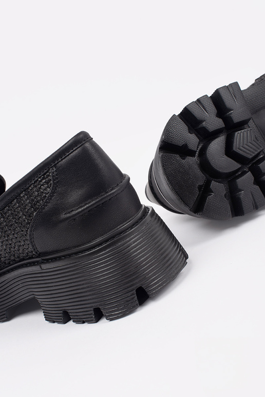 black INomens moccasins Inith a gold...