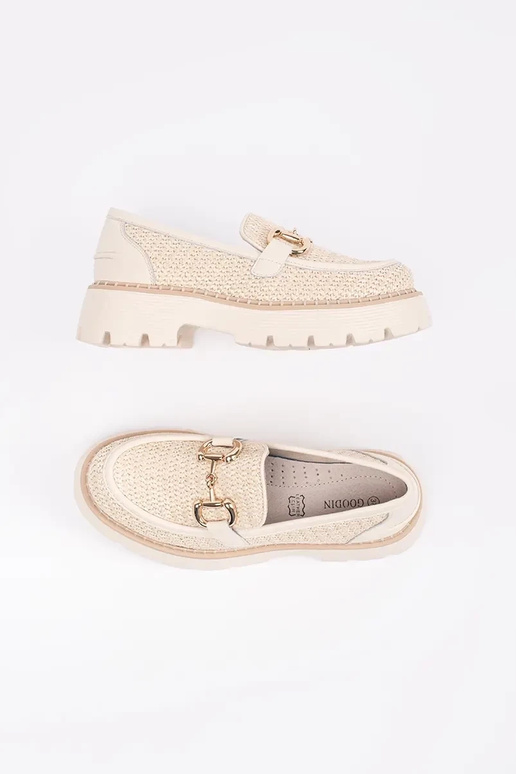 beige INomens moccasins Inith a gold... beige INomens moccasins Inith a gold...