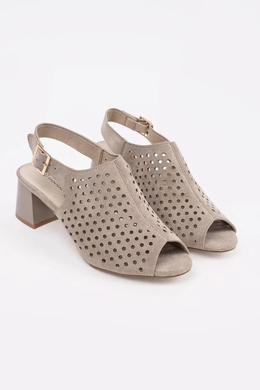 beige sandals on highheels of suede