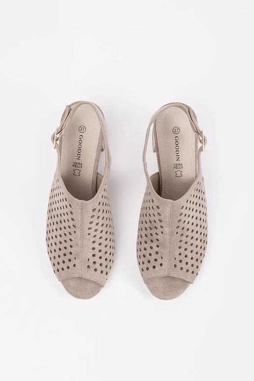 beige sandals on highheels of suede