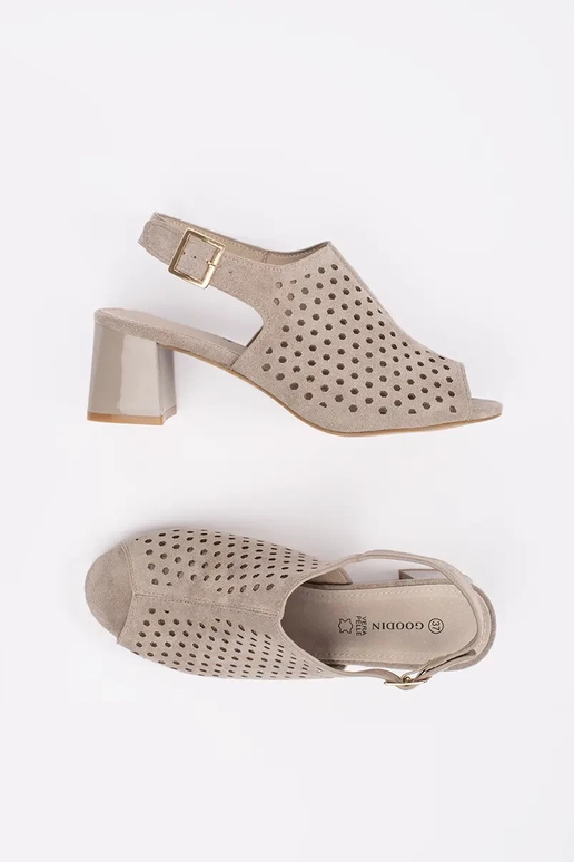 beige sandals on highheels of suede