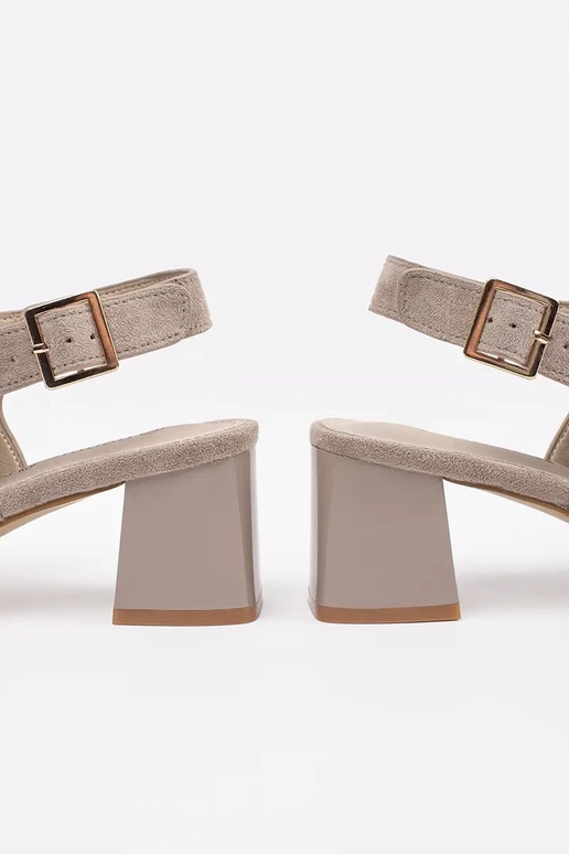 beige sandals on highheels of suede