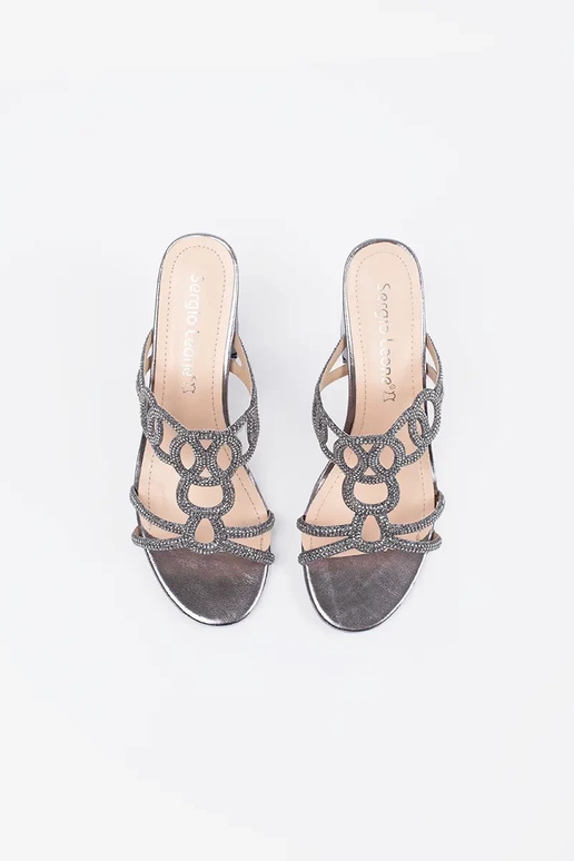 silver color slippers on highheels...