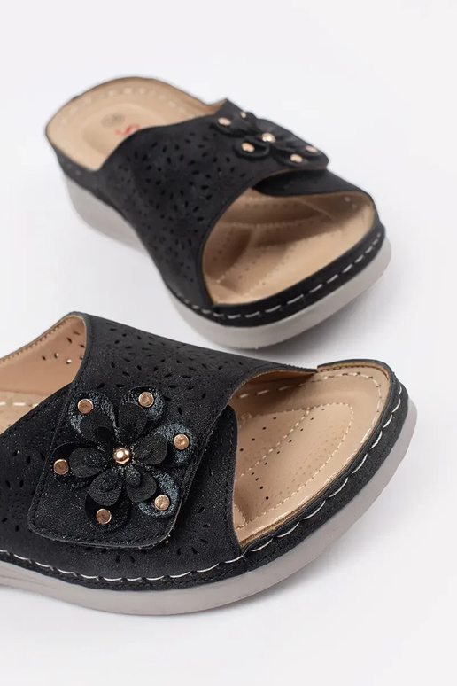 black slippers Inomens on a thick sole