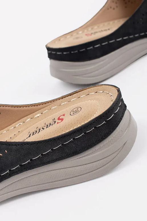 black slippers Inomens on a thick sole