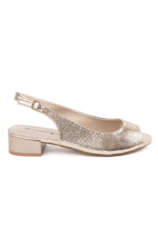 gold color openInork sandals on a... gold color openInork sandals on a...