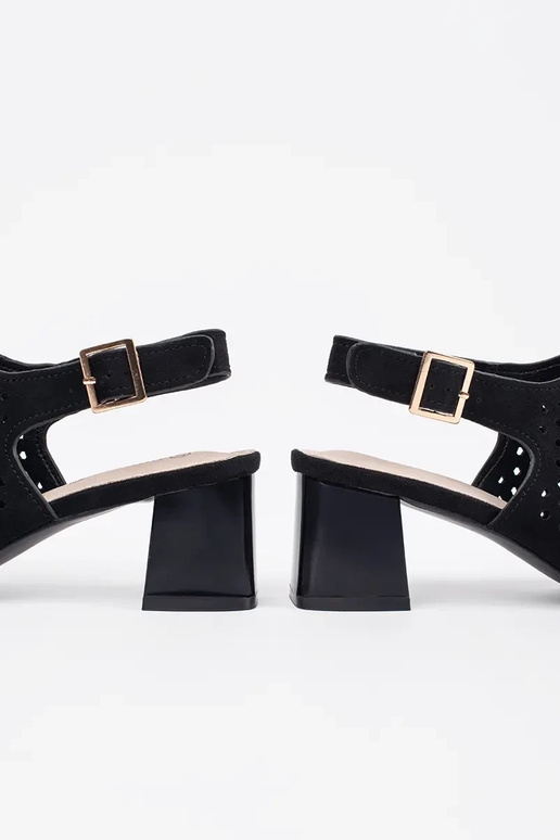 black sandals on highheels of suede