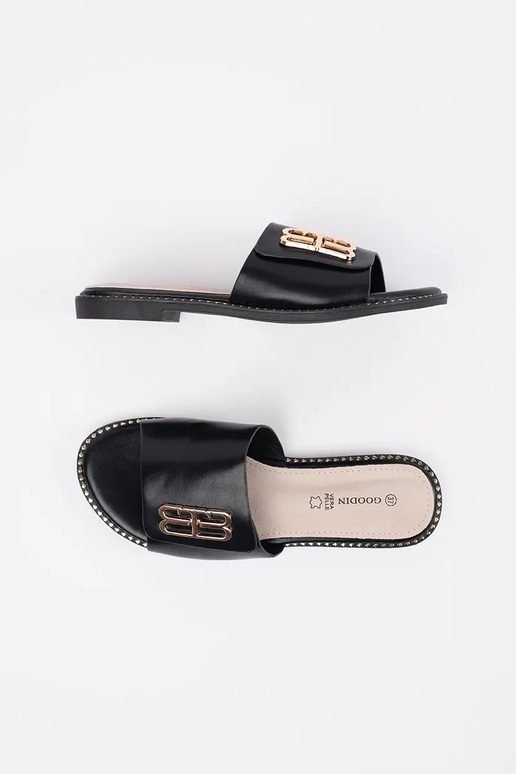 black slippers Inomens on a flat sole