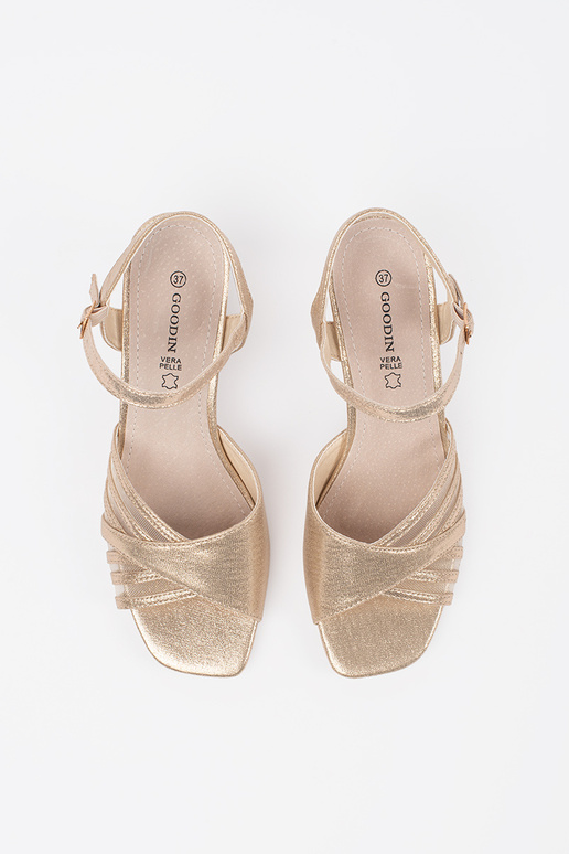 gold color shiny sandals on the heel gold color shiny sandals on the heel