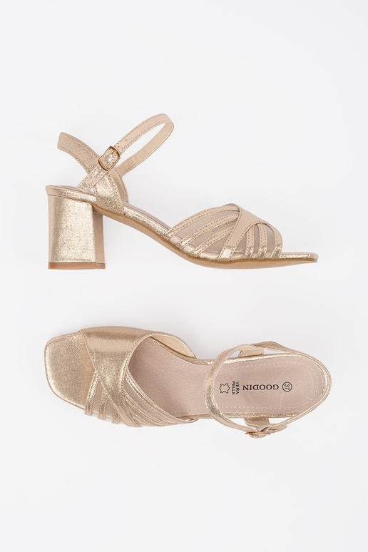 gold color shiny sandals on the heel gold color shiny sandals on the heel