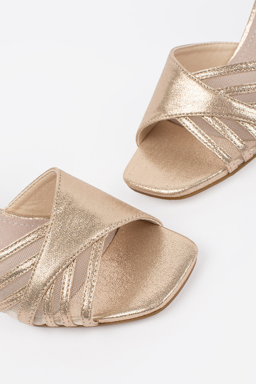 gold color shiny sandals on the heel gold color shiny sandals on the heel