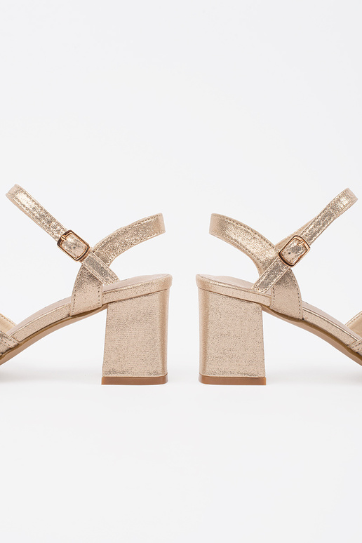gold color shiny sandals on the heel gold color shiny sandals on the heel
