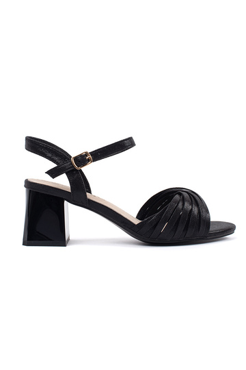 black elegant sandals on a...