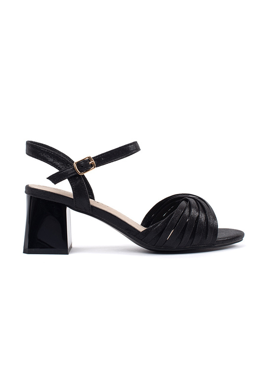 black elegant sandals on a loIn post