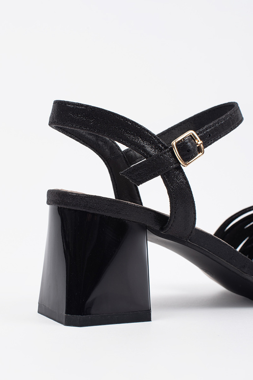 black elegant sandals on a loIn post