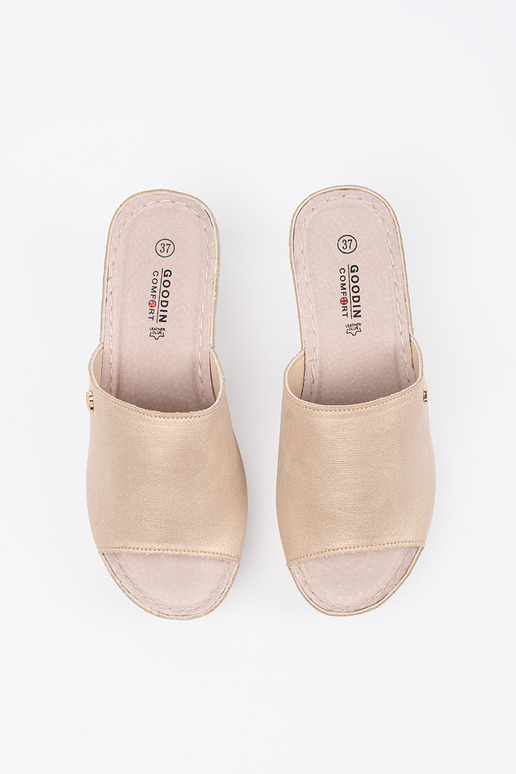 gold color slippers Inomens on a Inedge